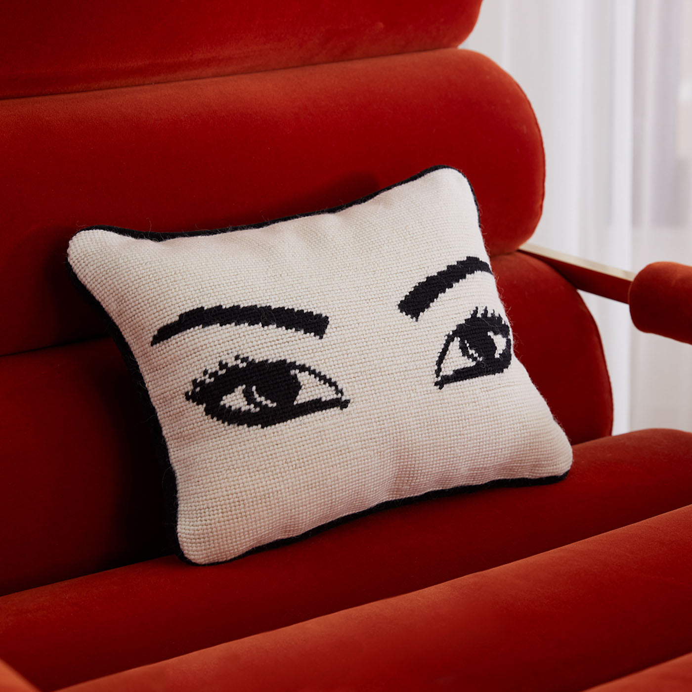 eyes needlepoint throw pillow mrs. godfrey chair - styled view