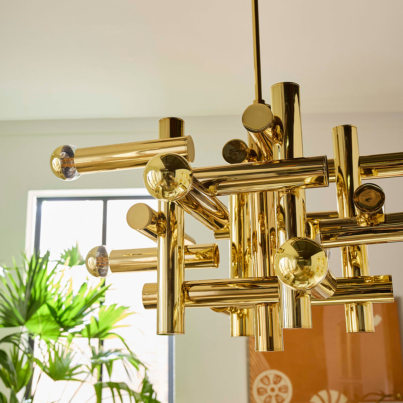 milano kinetic chandelier brass styled