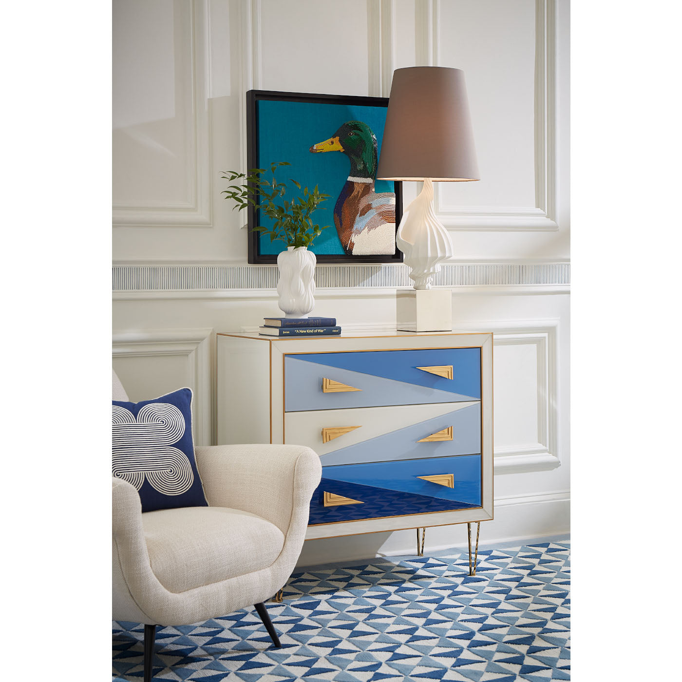 large balloon vase shell table lamp harlequin three-drawer chest vignette - styled view