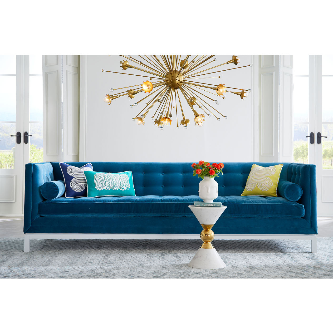 giant sputnik chandelier brass lampert grand sofa - styled view