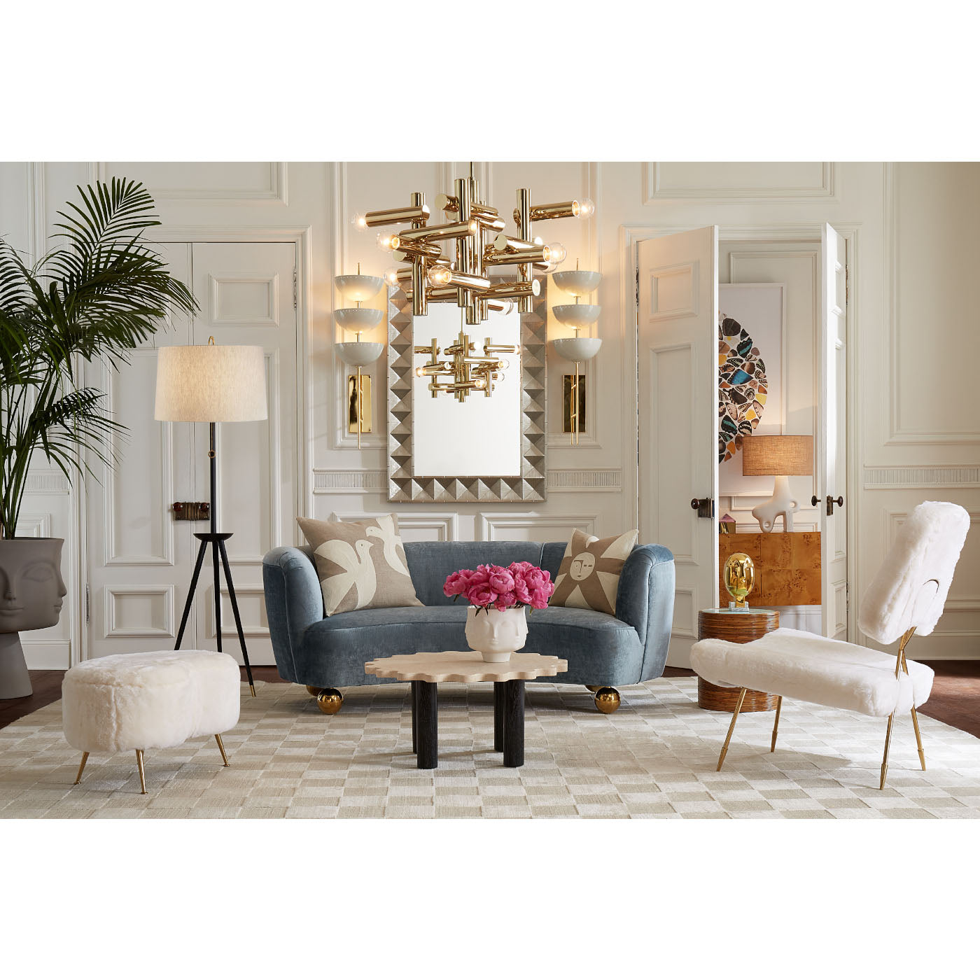 milano kinetic chandelier brass claridge sofa riviera cocktail table - styled view