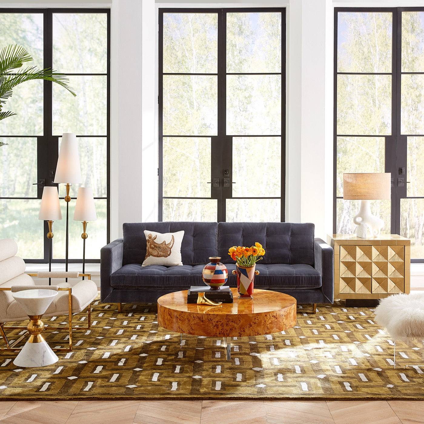 bond round cocktail table ford sofa thebes hand tufted rug - styled view
