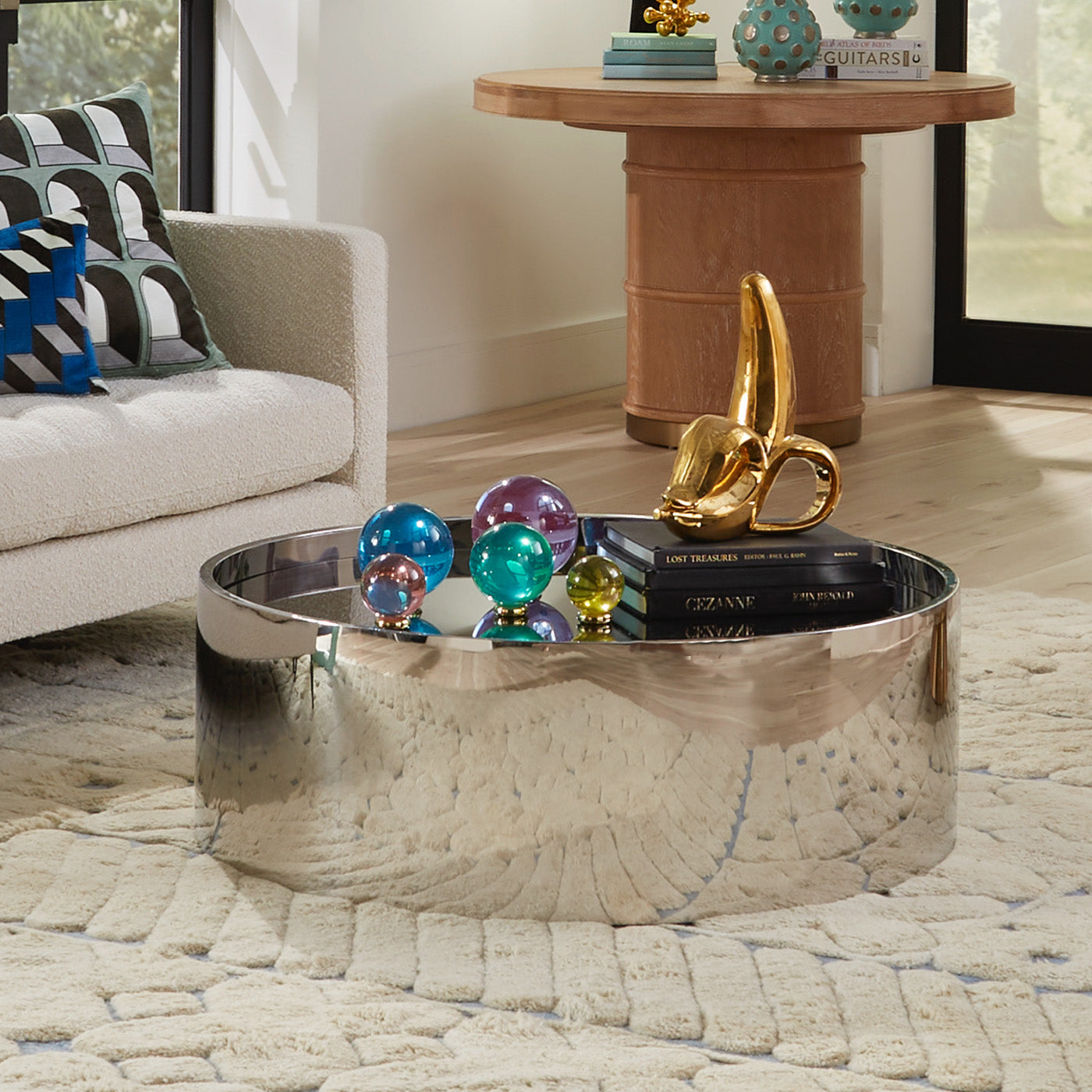 acrylic orb set brass banana alphaville cocktail table - styled view