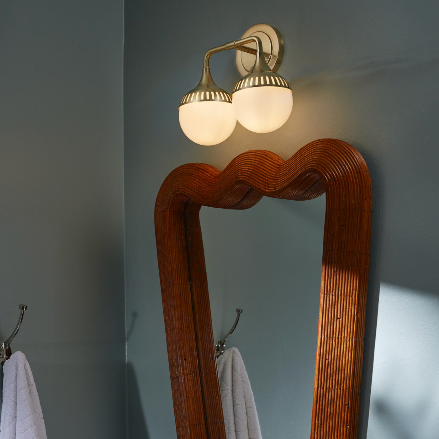 rio two light sconce brass riviera ripple mirror - styled view