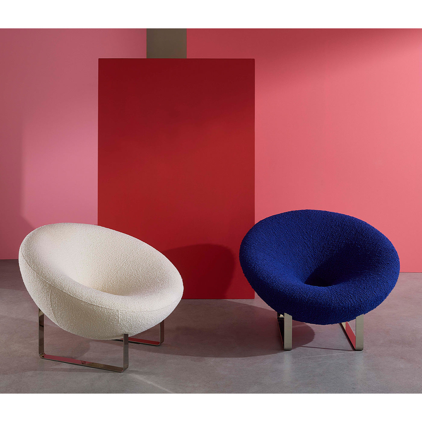 Saturn Lounge Chairs with red background styled view