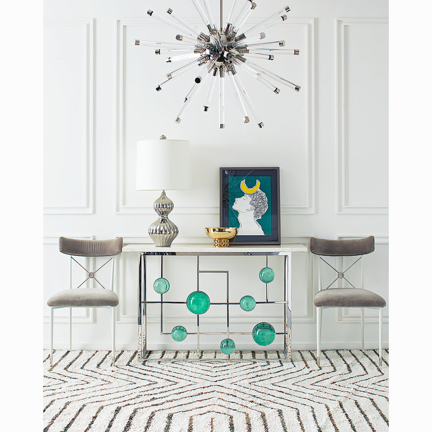globo fretwork console rider dining chairs nixon centerpiece bowl vignette - styled view