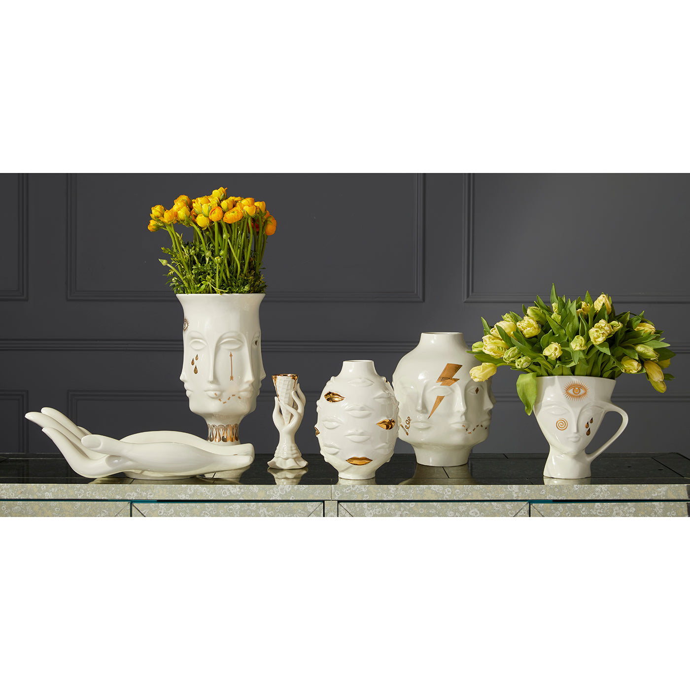 gilded muse pottery collection with flowers - styled view
