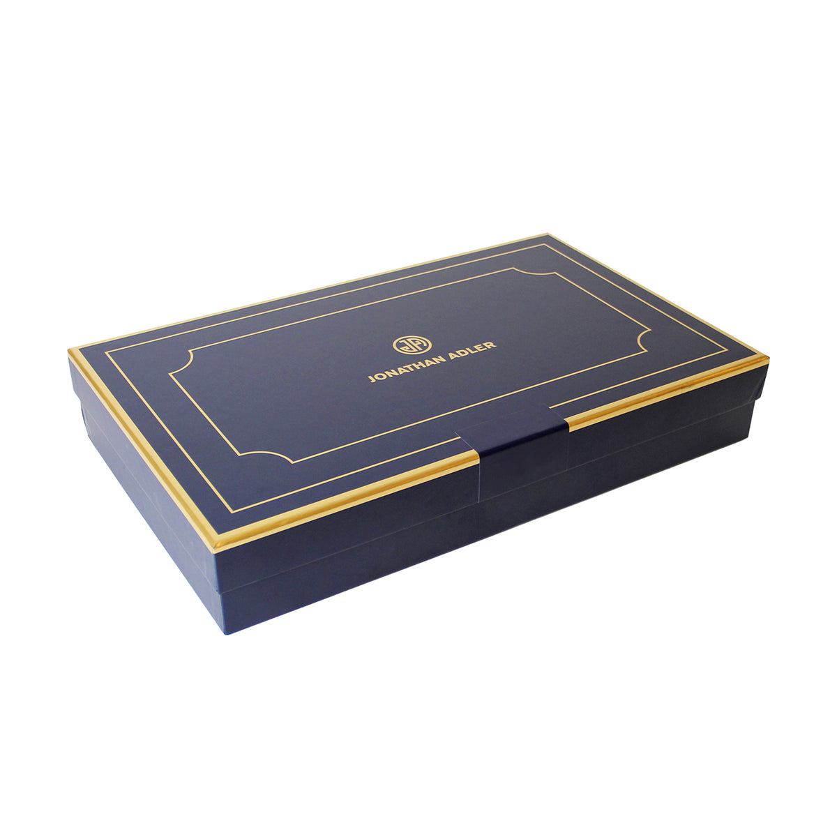 Jonathan Adler navy blue gift box with gold trim and gold logo on the lid, shown at an angle on a white background.