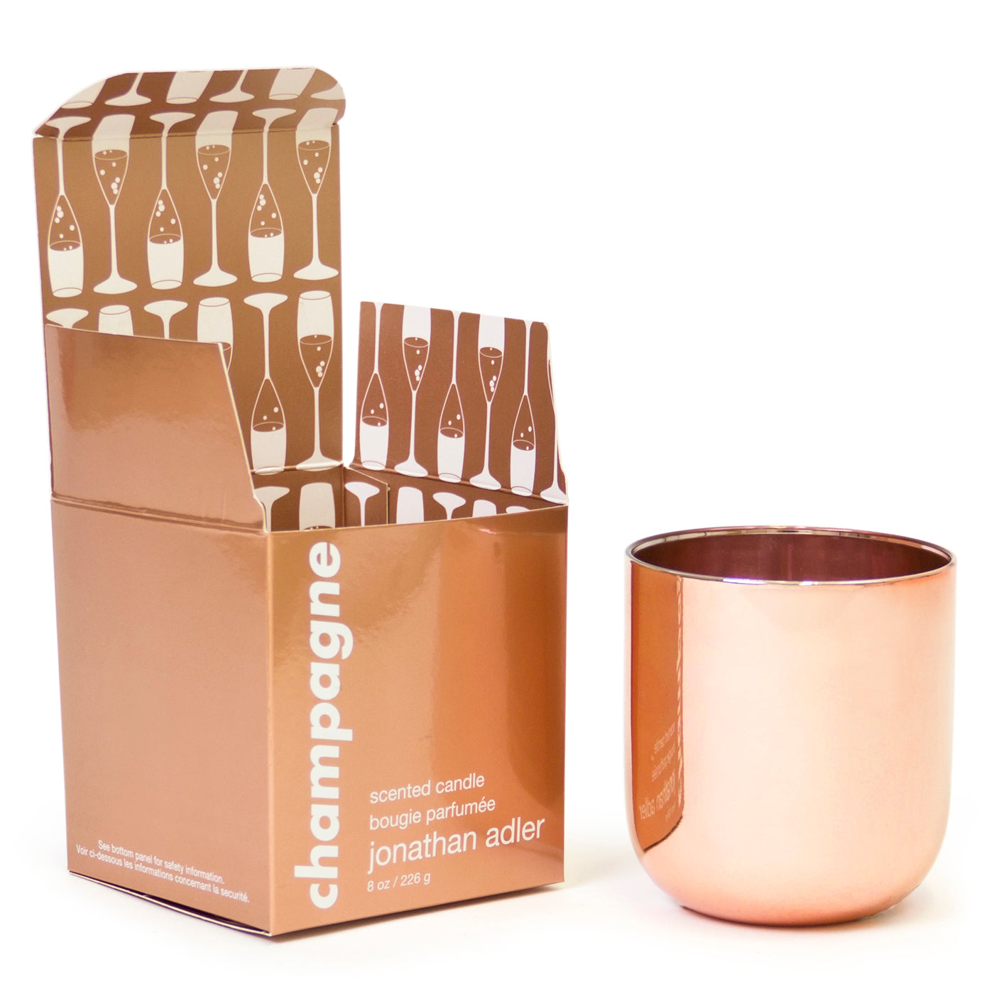 champagne pop candle rose gold with box - angle view
