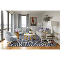 scalinatella cocktail table ether chairs lampert t-arm sofa living room - styled view