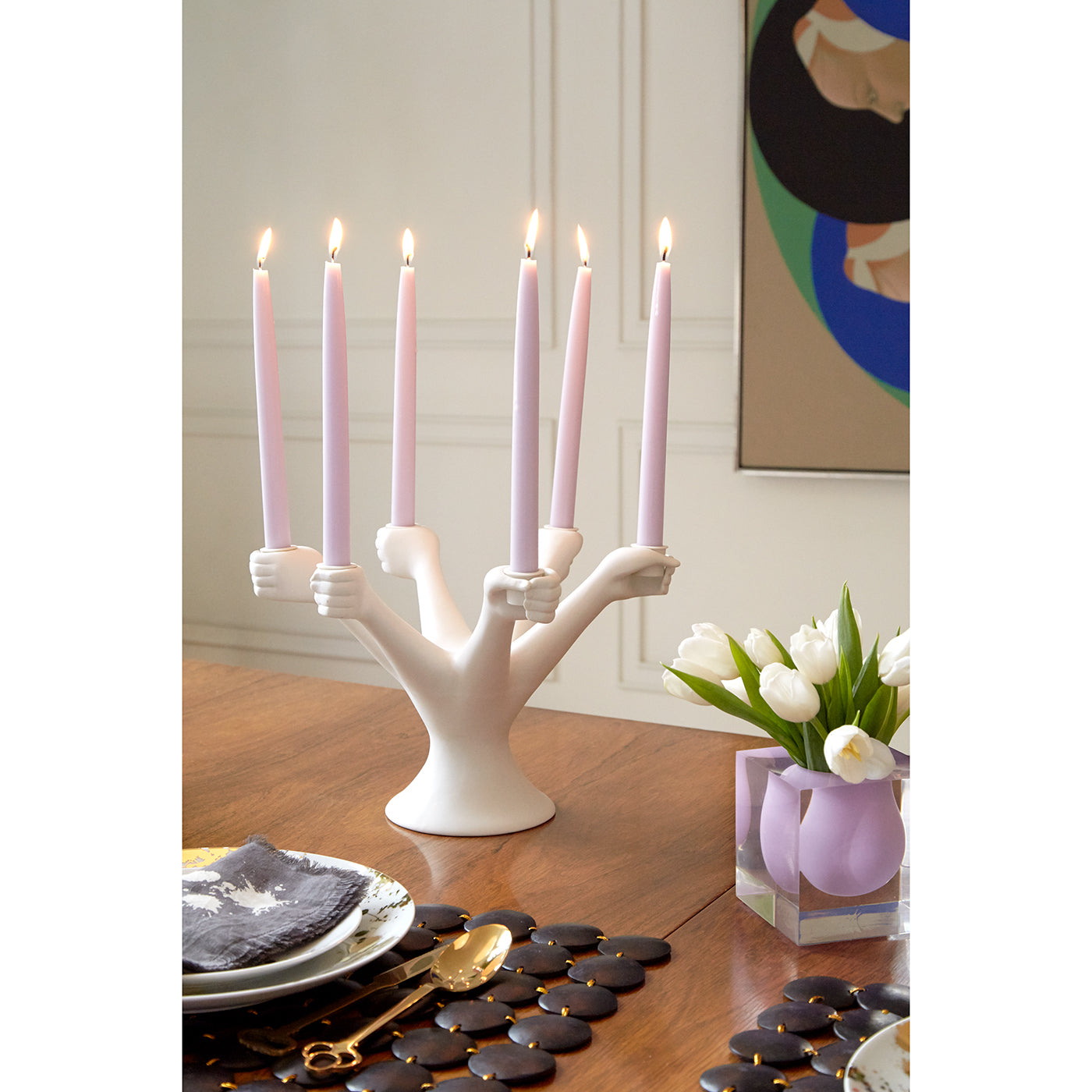eve candelabra with purple lit candles - styled view