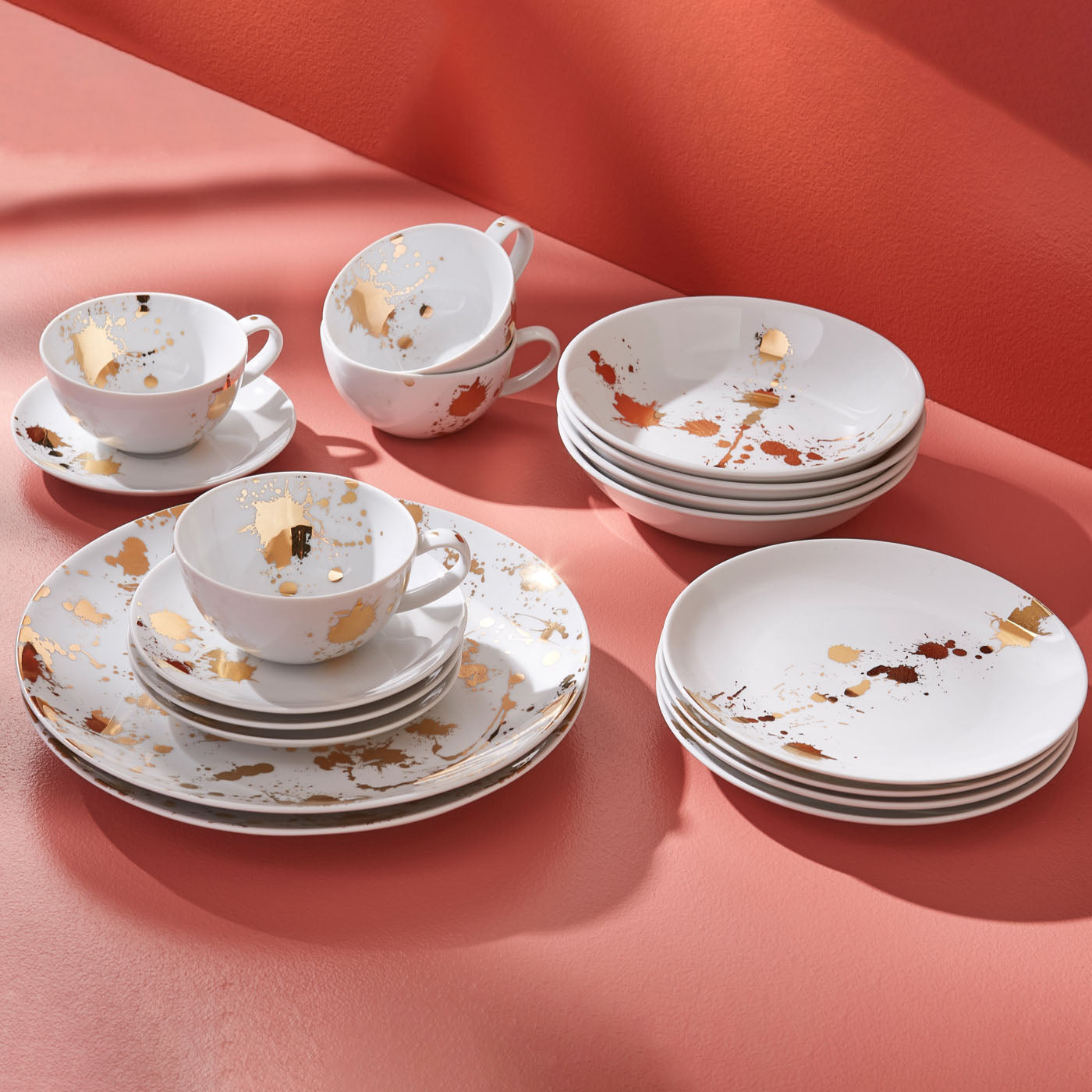 1948 dinnerware collection red background - styled view