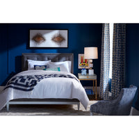 eyes beaded wall art baxter t-arm sofa ripple circle travertine cocktail table - styled view