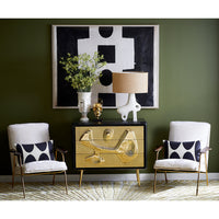 gilded dora maar urn with flowers reform three-drawer chest ingmar chairs - styled view