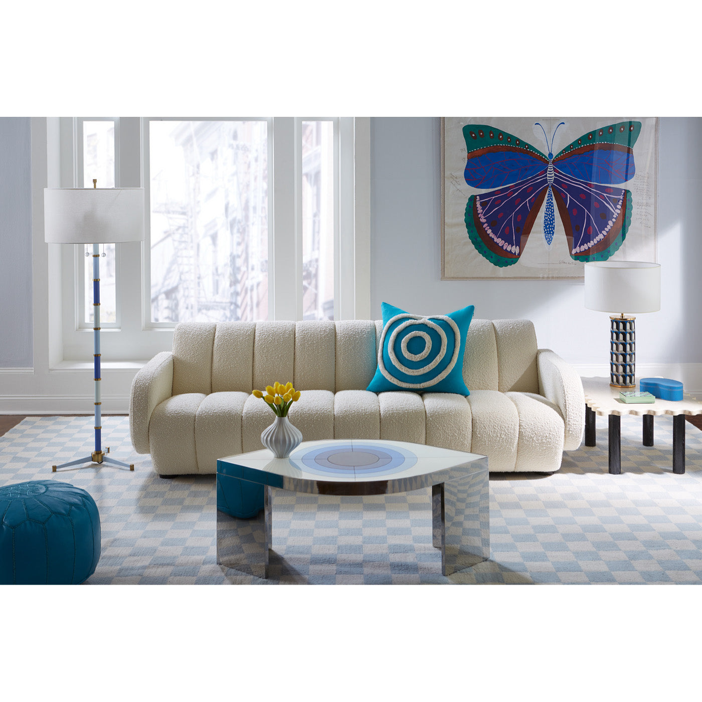 small scale checkerboard flat weave rug brigitte sofa harlequin eye cocktail table - styled view