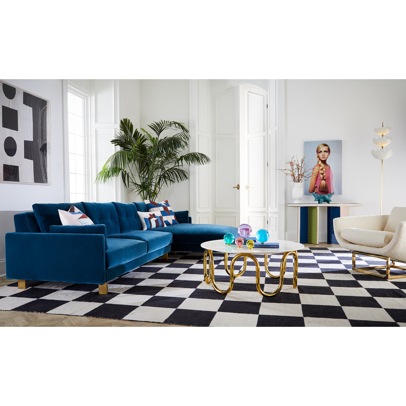 large scale checkerboard flat weave rug malibu sectional scalinatella cocktail table - styled view