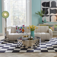 brigitte sofa happy pills pillow alphaville cocktail table large scale checkerboard rug living room - styled view