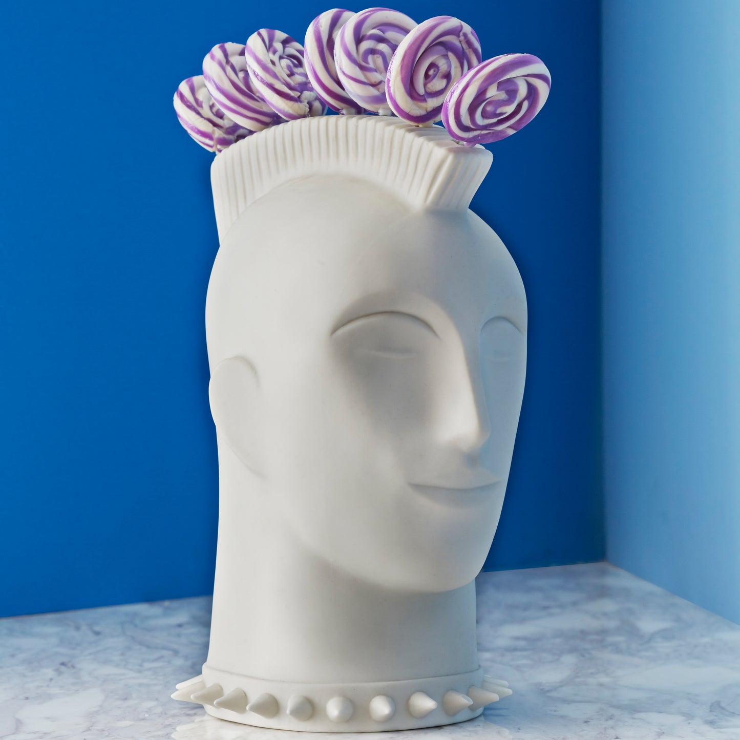 mohawk lollipop holder with purple and white lollipops - styled view