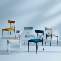 Set of five chairs with different colored seats against a light blue background