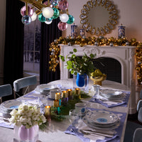 Cobalt blue vase holiday dining scene shot