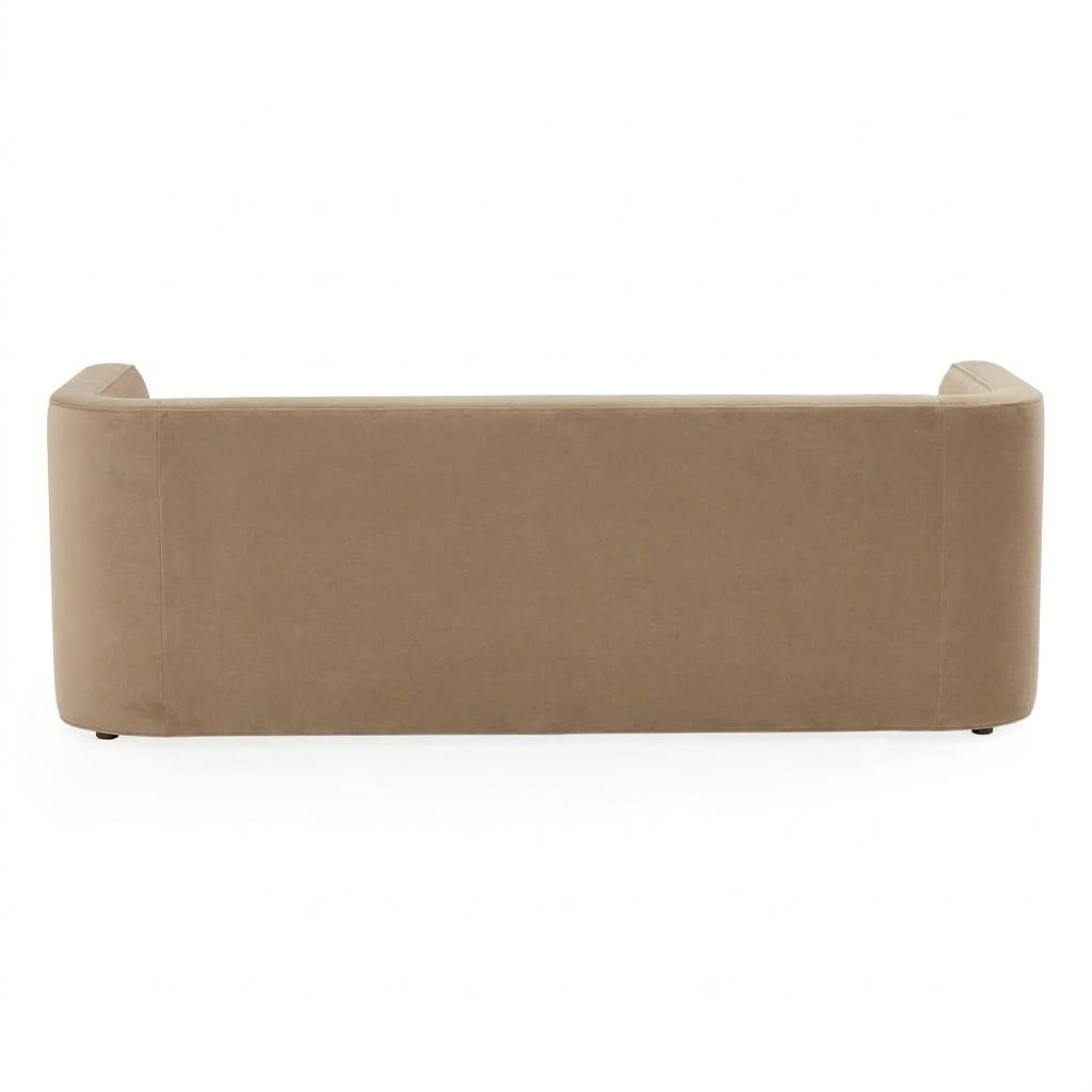 A low-profile rectangular sofa or bench upholstered in a warm taupe fabric, shown from the back against a plain white background.