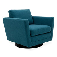 A modern teal blue upholstered swivel armchair with a black circular base, shown on a plain white background.