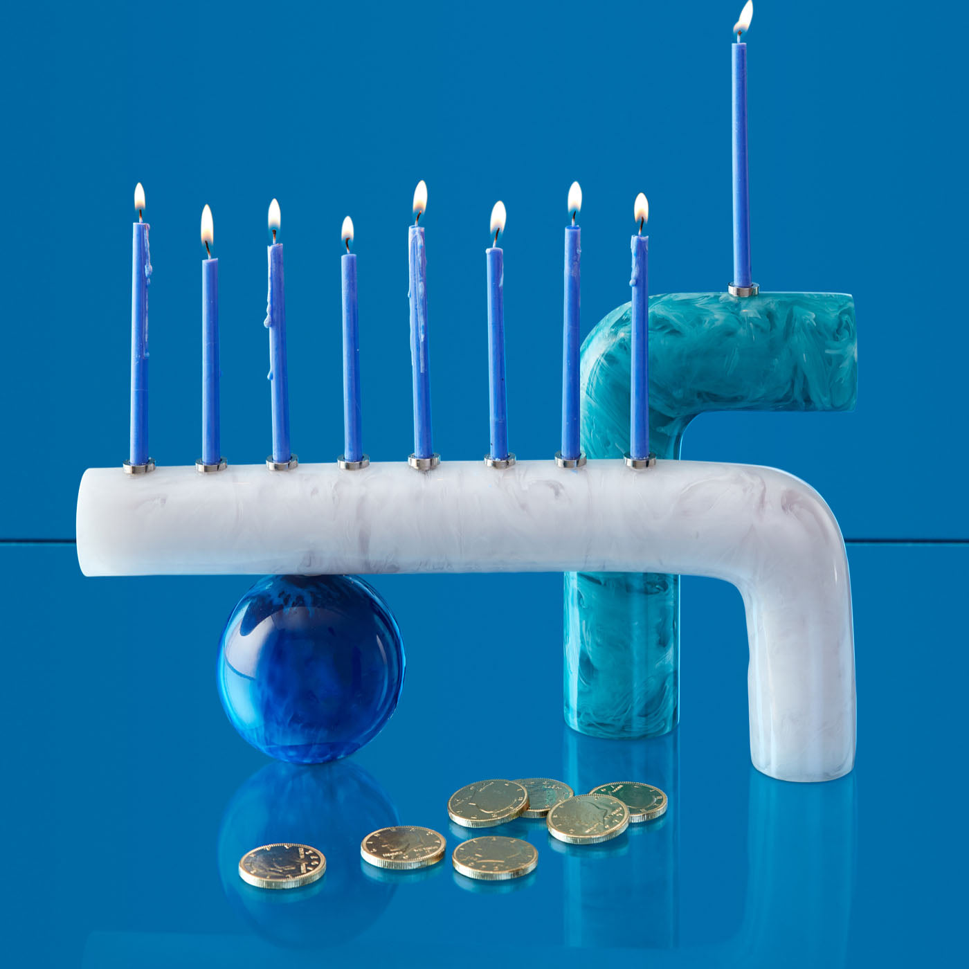 Mustique Menorah - styled view with coins