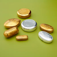 viagra pill box brass open - angle view