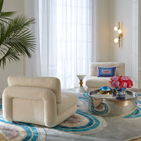 Globo Three-Light Sconce with Ether Curved Sofa