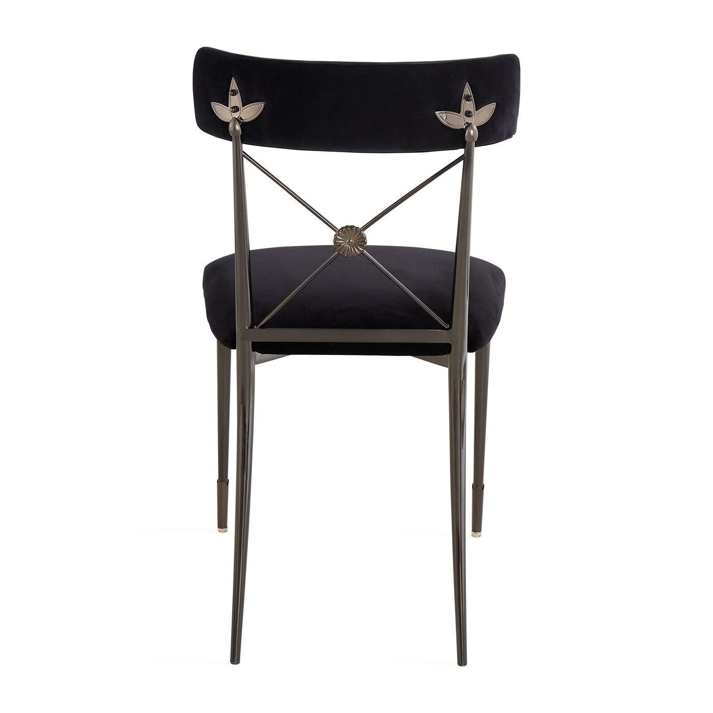 Black chair with decorative metal backrest on a white background