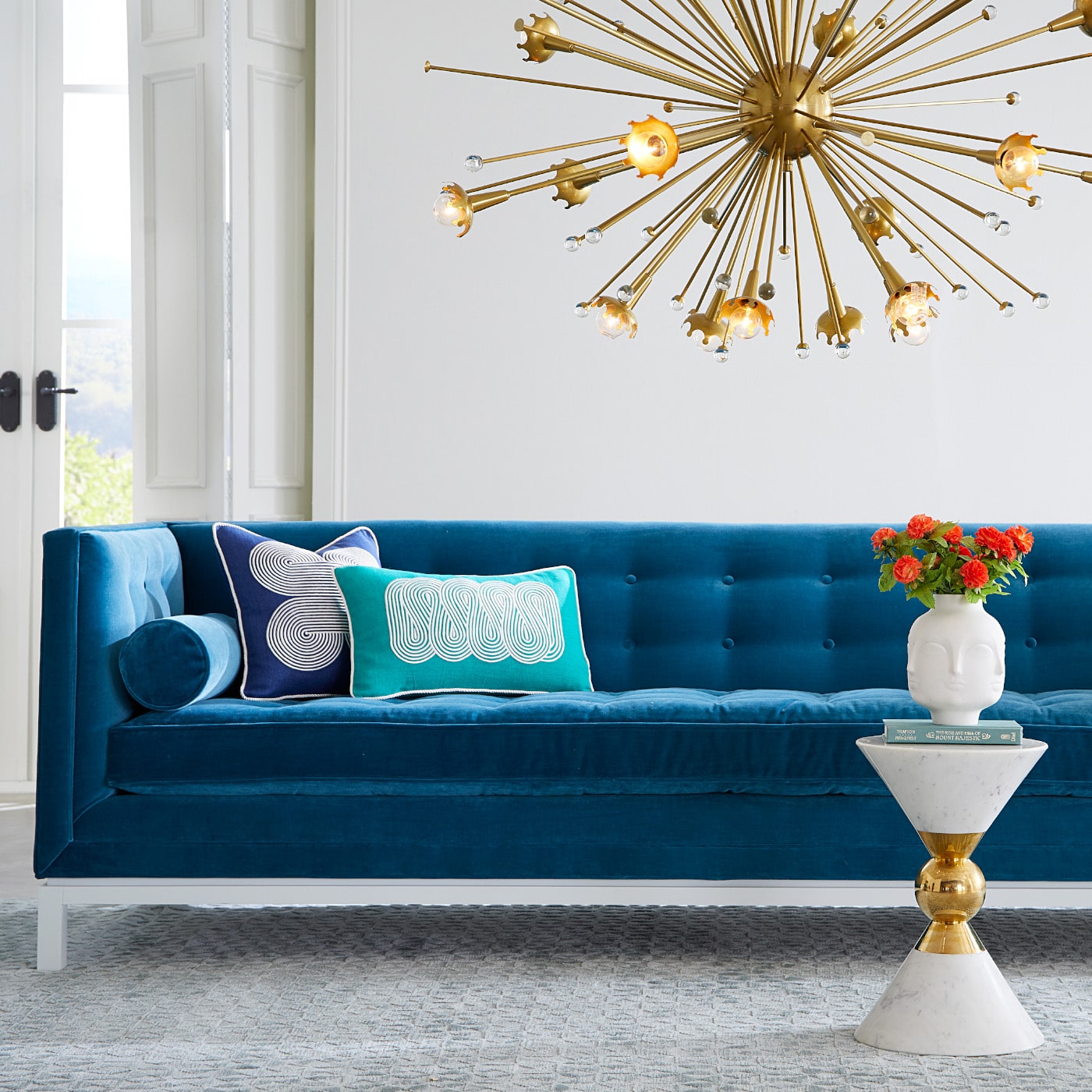 dora maar vase lampert grand sofa giant sputnik chandelier - styled view