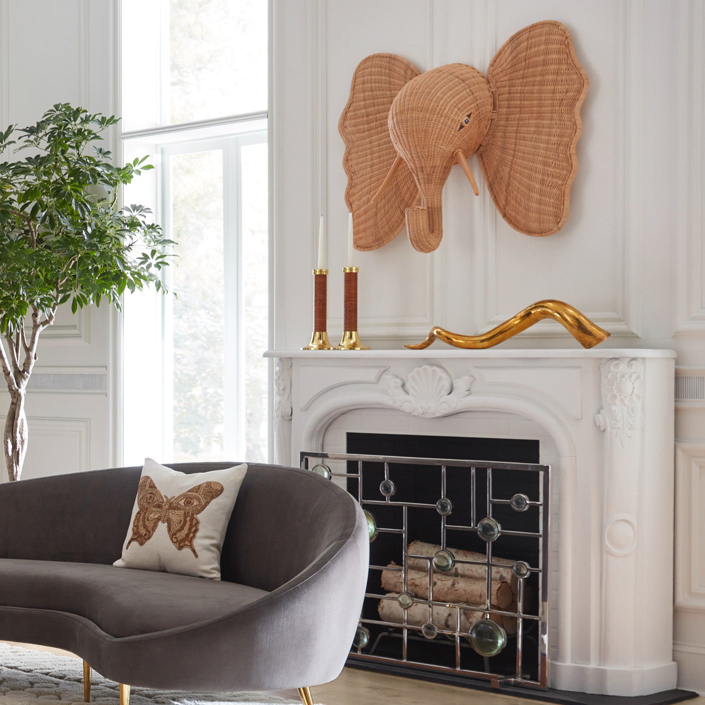 wicker elephant wall art riviera candle holders giant brass horn fireplace mantle - styled view
