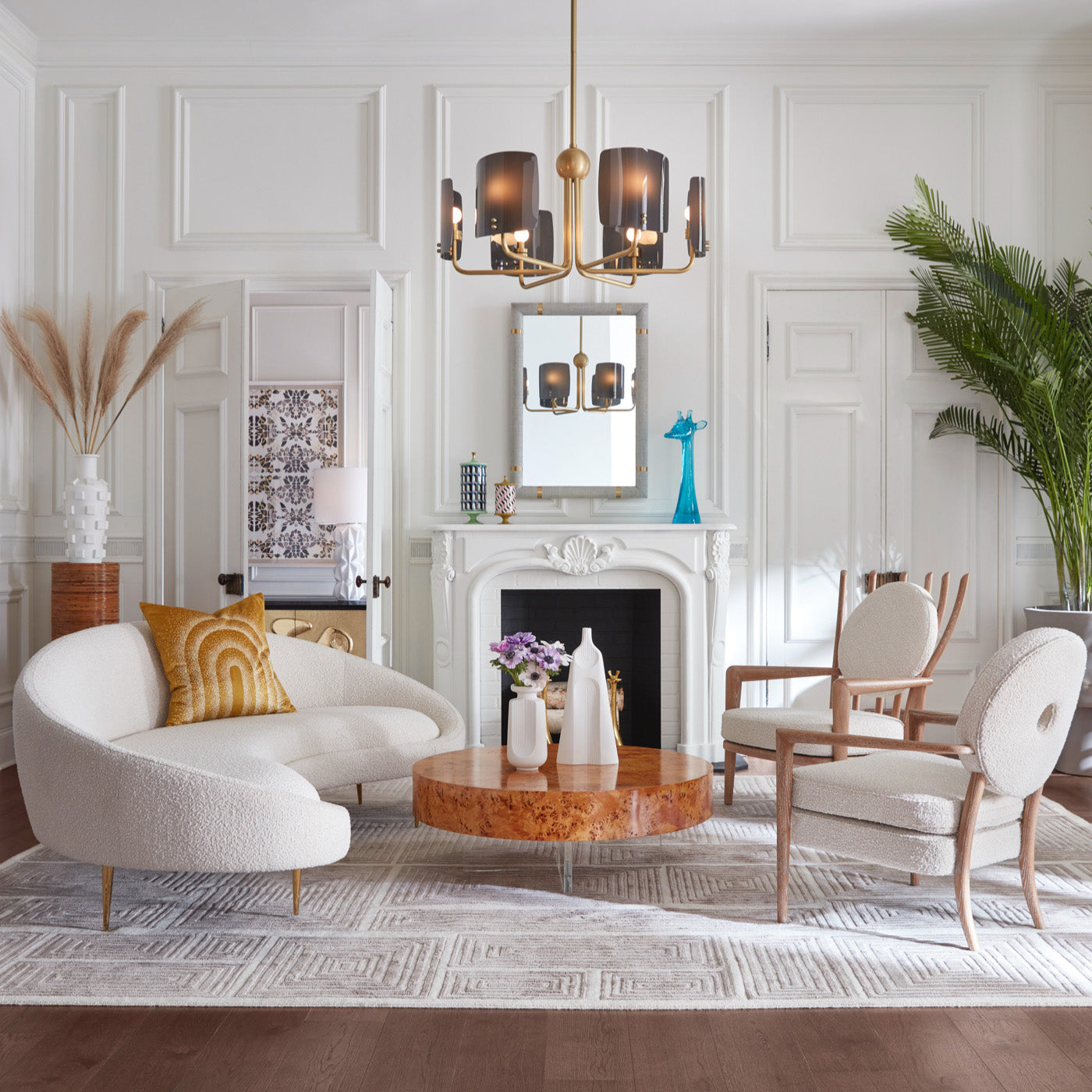 ether curved sofa torino nesting cocktail table ingmar chairs living room - styled view