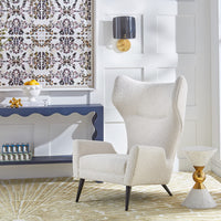 polly sconce milano wing chair flow leather console - styled view