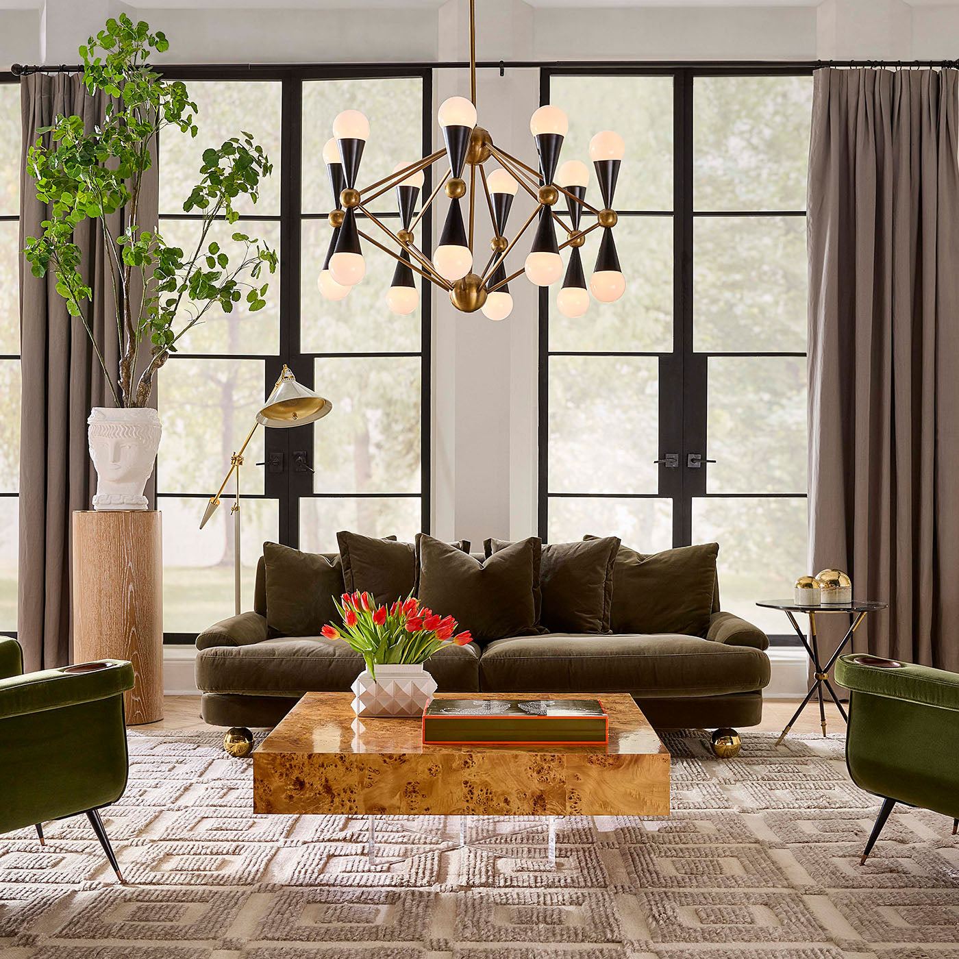 Modern living room with brown sofa, wooden coffee table, and decorative elements.
