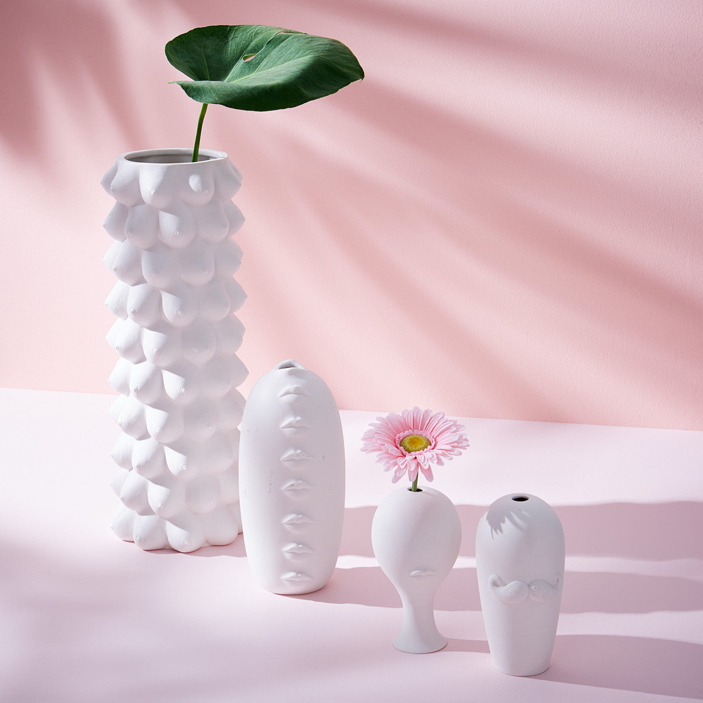 muse pottery collection pink background - styled view