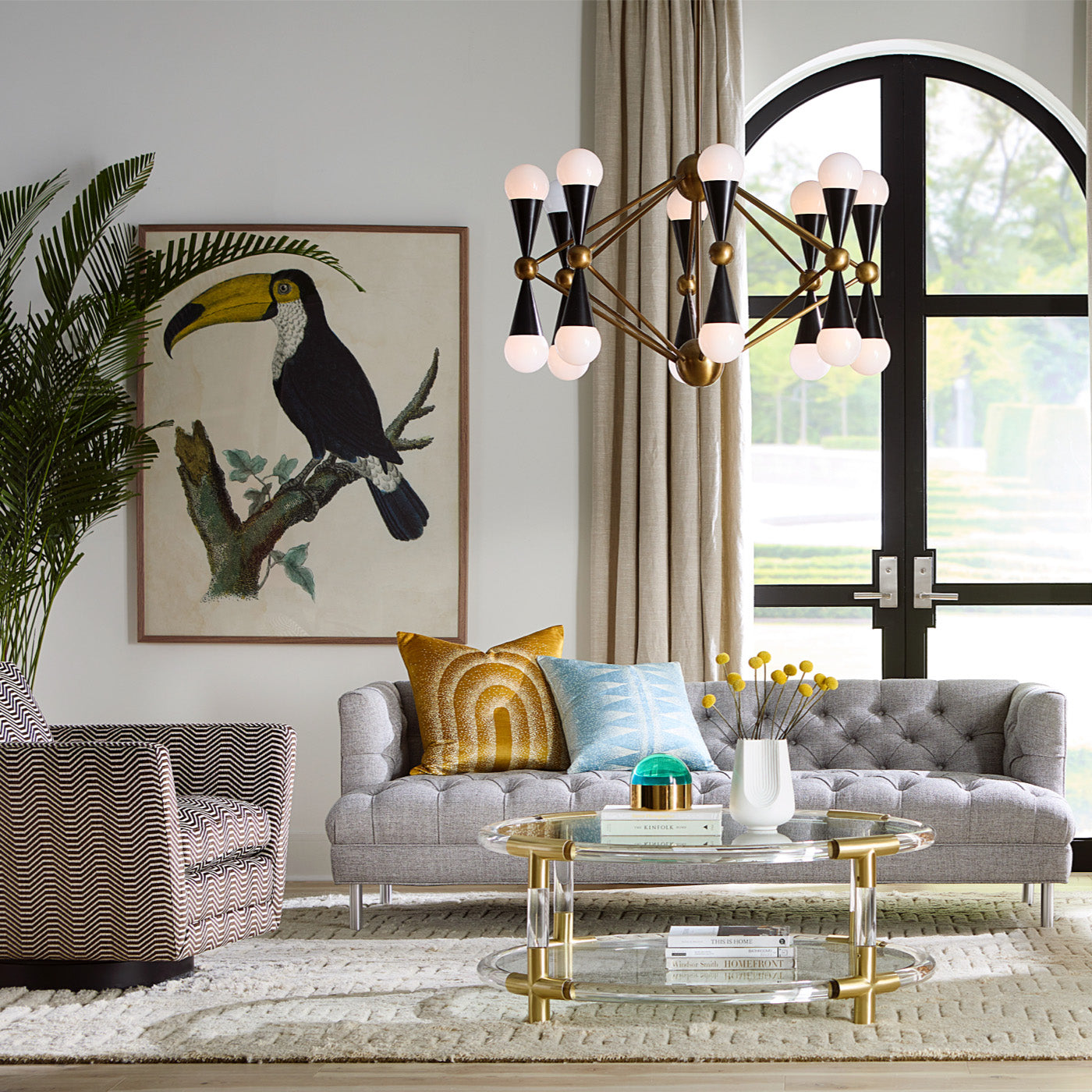 jacques round cocktail table clear acrylic brass accents - styled view 2
