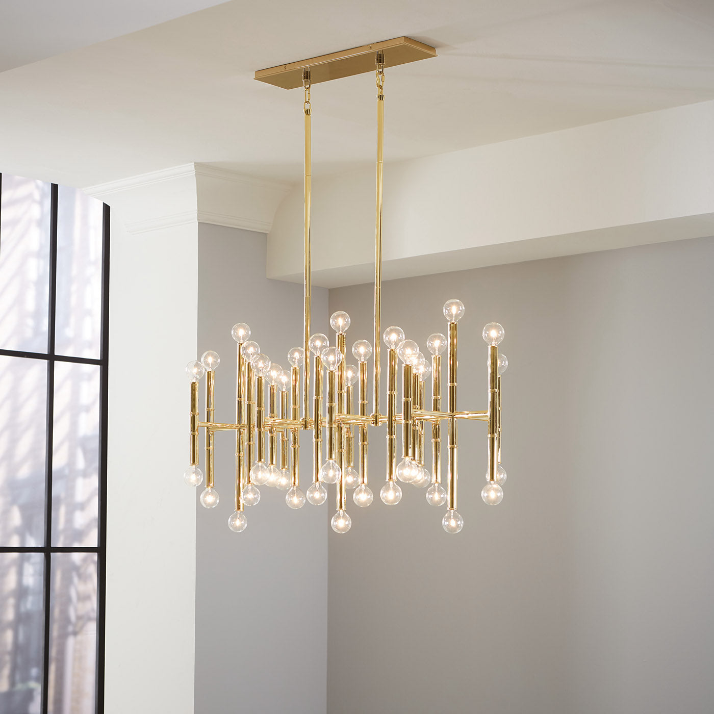 meurice rectangle chandelier brass bond dining table maxime dining chairs - styled view
