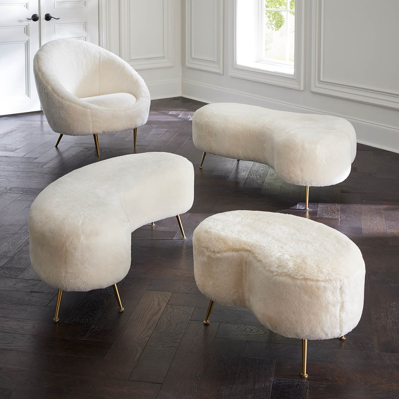 amorphic cocktail ottoman shearling white brass feet - angle view