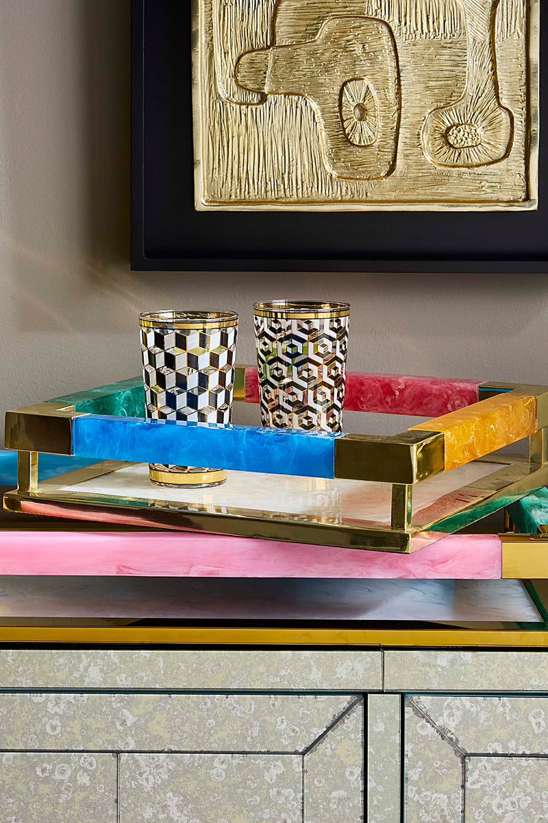 Colorful trays with brass accents 