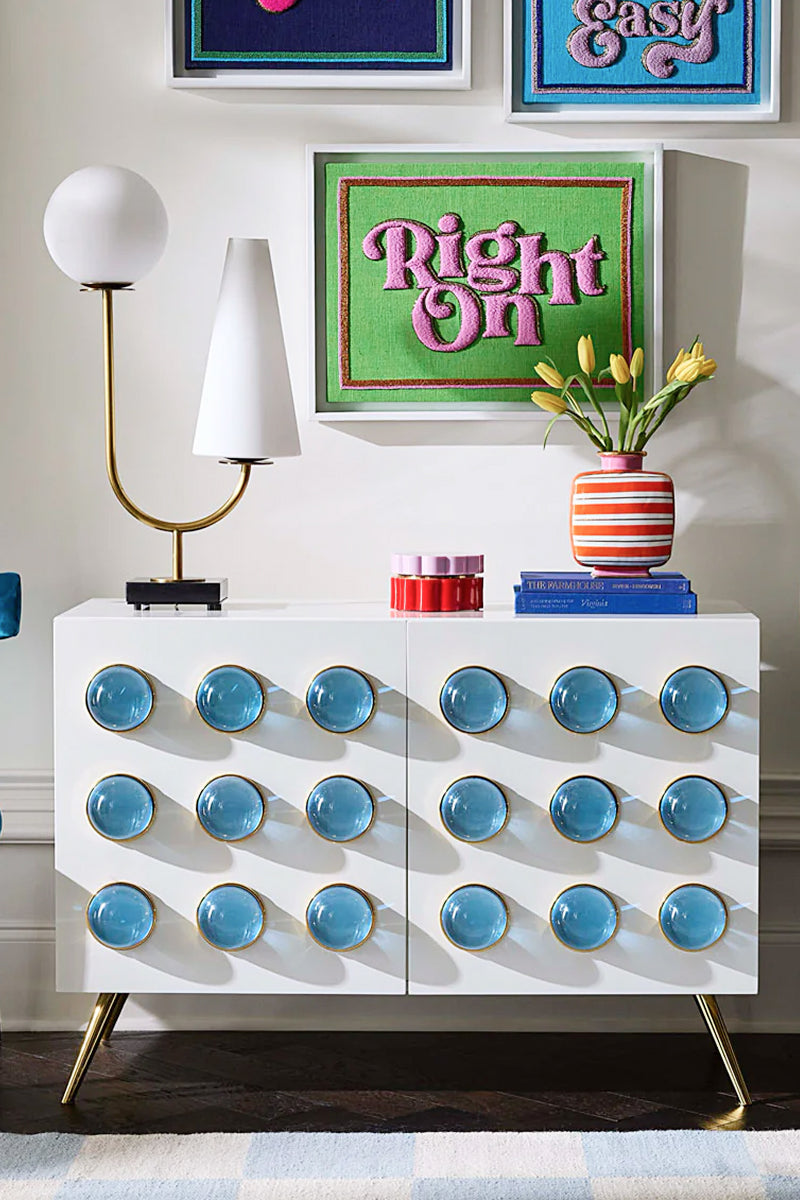 White cabinet with blue clear acrylic balls
