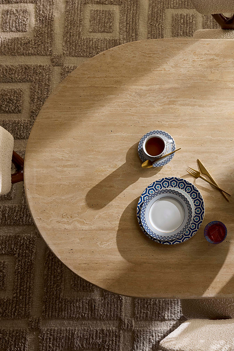 overhead view of curved wood dining table 