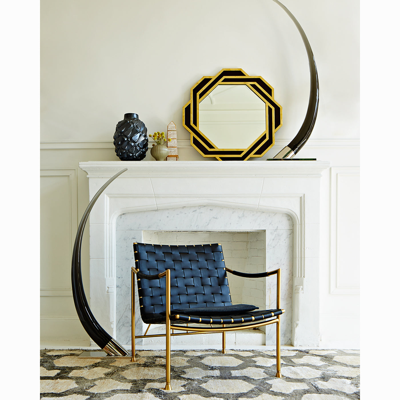giant acrylic tusks thebes lounge chair fireplace - styled view