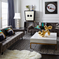 giant brass orb peking cocktail table living room - styled view