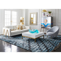 talitha mirror maxime sofa peking cocktail table ether chair - styled view