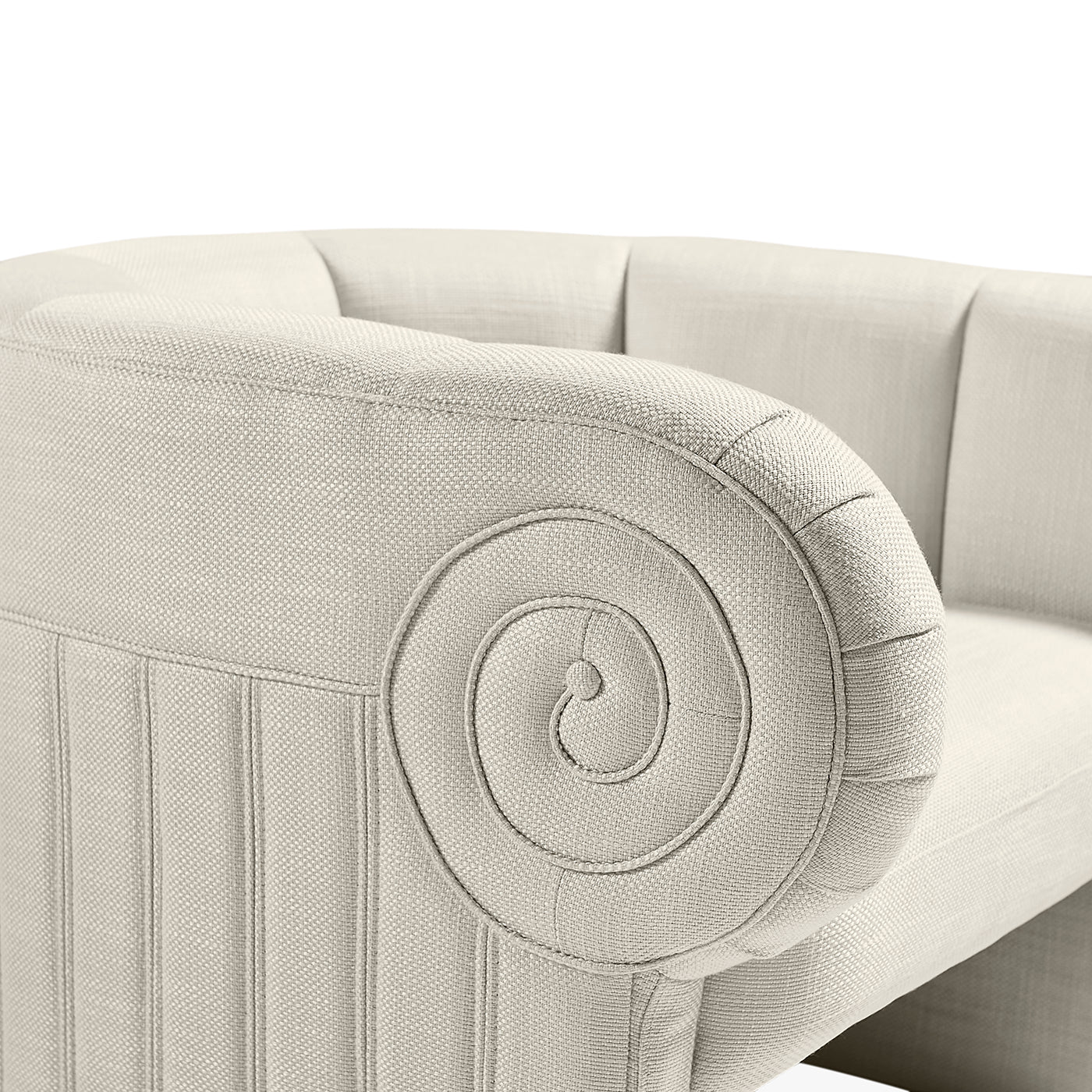Close-up of a beige upholstered chair with decorative stitching on a white background