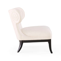 White armchair with decorative backrest on a white background