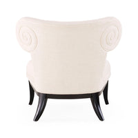 Decorative armchair with spiral patterns on a white background