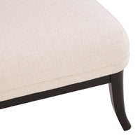 Close-up of a beige upholstered chair with dark wooden legs on a white background