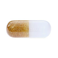 small acrylic pill gold glitter - front view